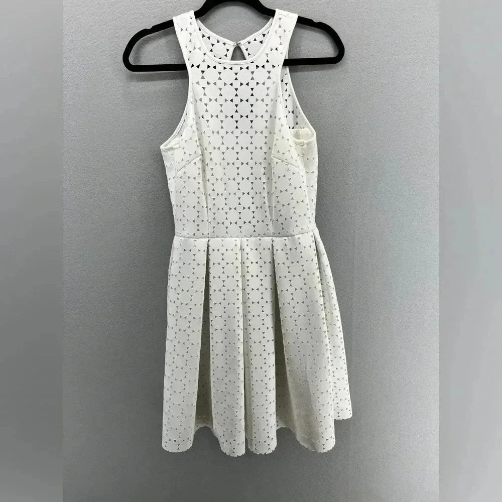 Trina Turk dress, fit and flare, double lined,white, knee length,Key hole back